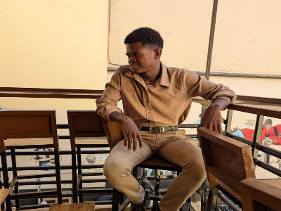 Information about this man sitting photo